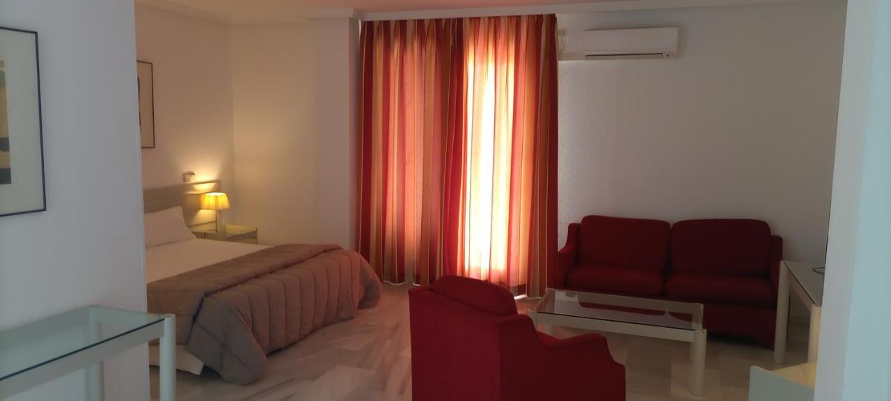 Hospedium Hotel Apartamentos Simon Verde Майрена-дель-Альхарафе Екстер'єр фото