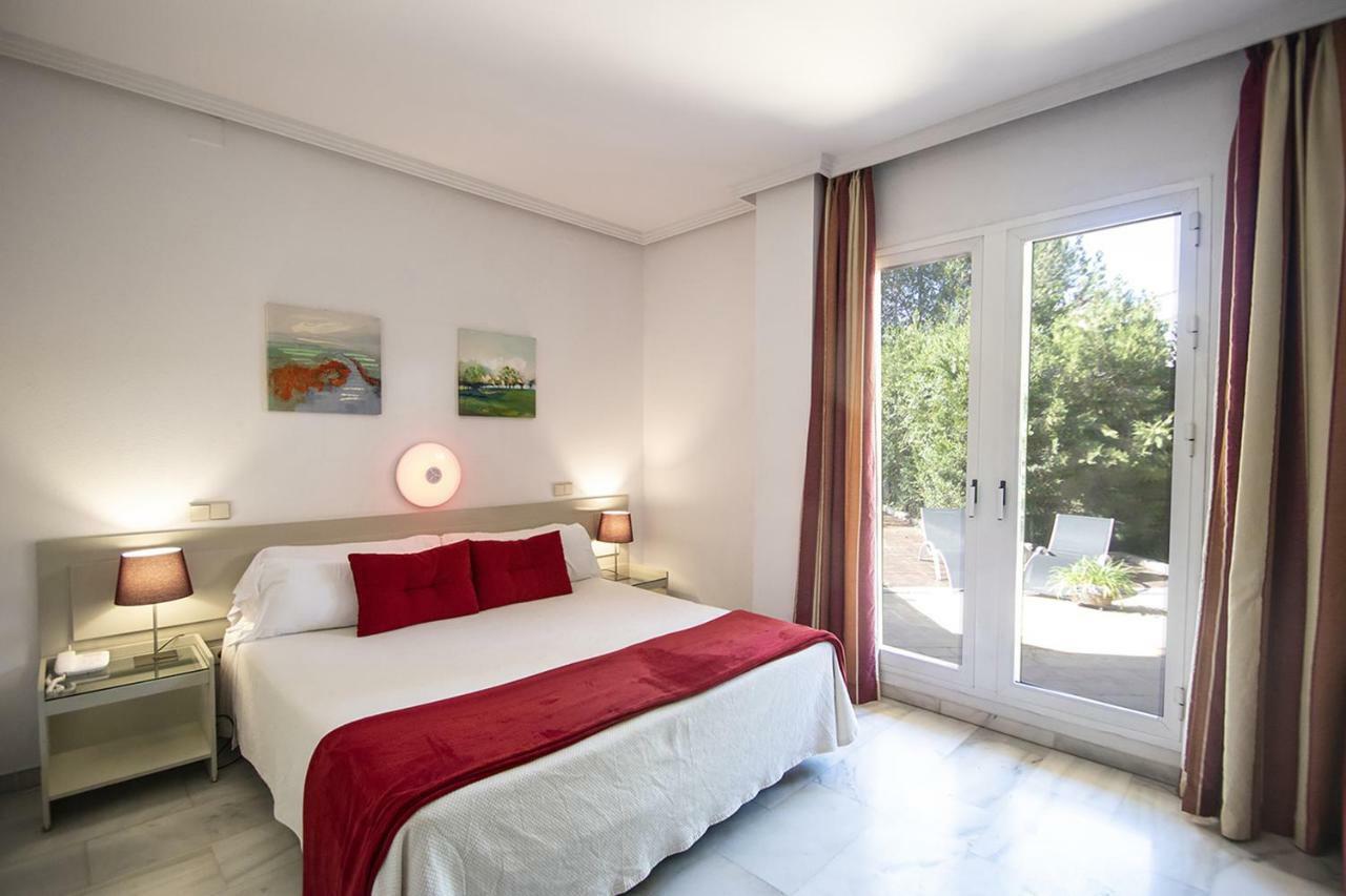 Hospedium Hotel Apartamentos Simon Verde Майрена-дель-Альхарафе Екстер'єр фото